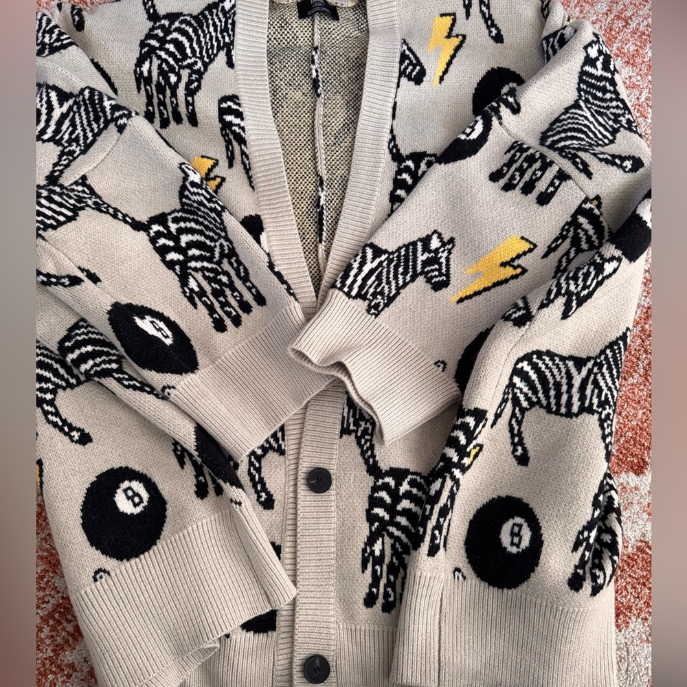 Dressed in lala cardigan. Never worn. No tags. S\m